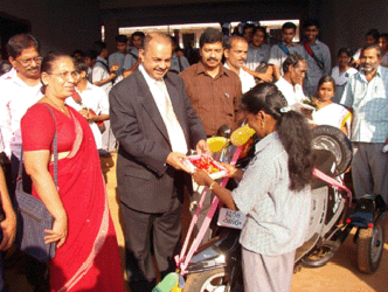 Dr. Majeed Presenting Sindhu A Scooter